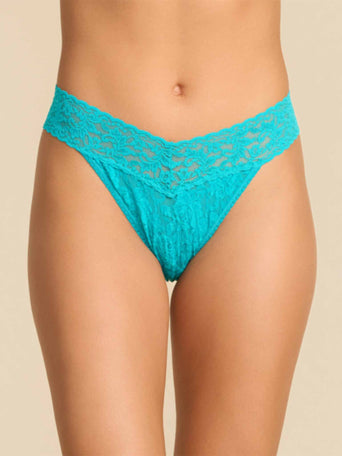 Model facing front wearing Signature Lace® Original Rise Thong Turkish Tile Blue