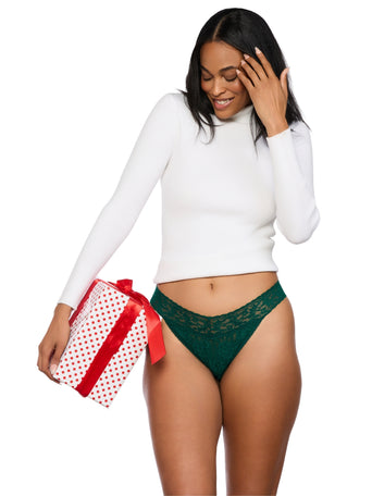 Forest Green Signature Lace Thong on Model Holding Gift - Holiday Front View | Hanky Panky