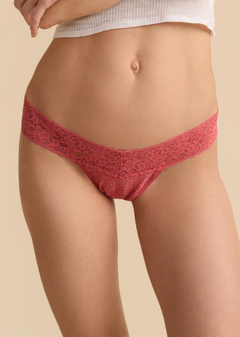 Naples Red Signature Lace® Low Rise Thong - Front View On Model, Warm Beige Background | Hanky Panky