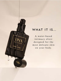 Black intimacy product with gold text on a beige background