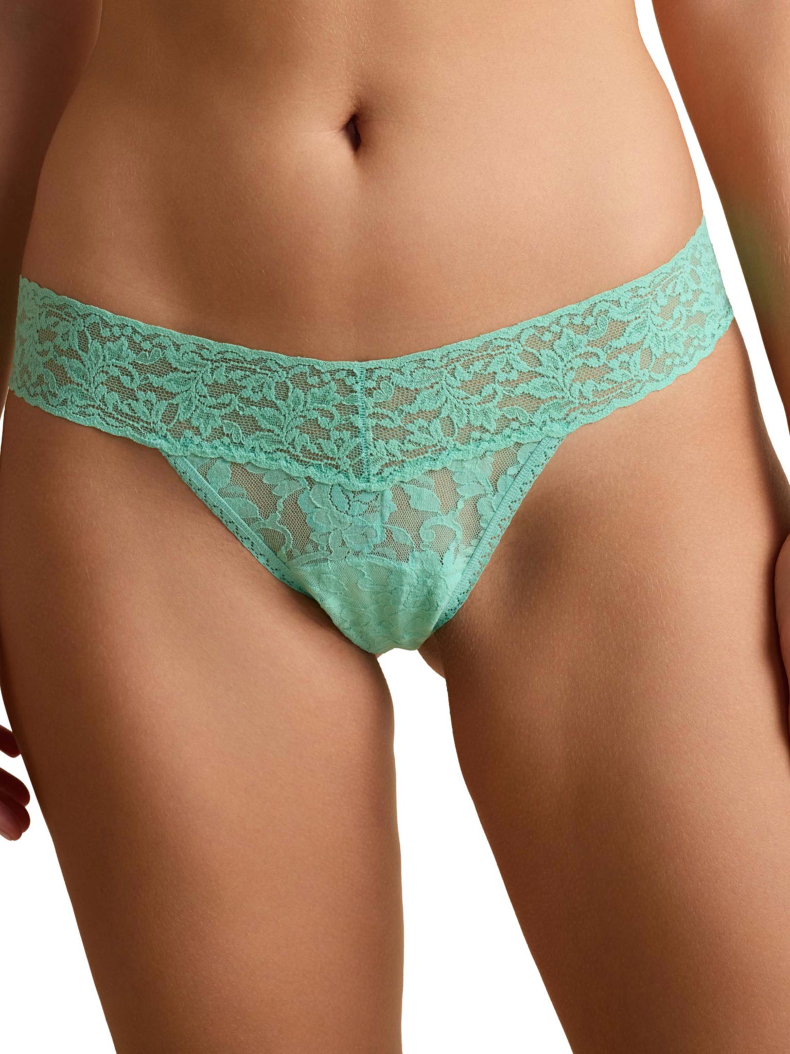 Teal lace underwear on a white background