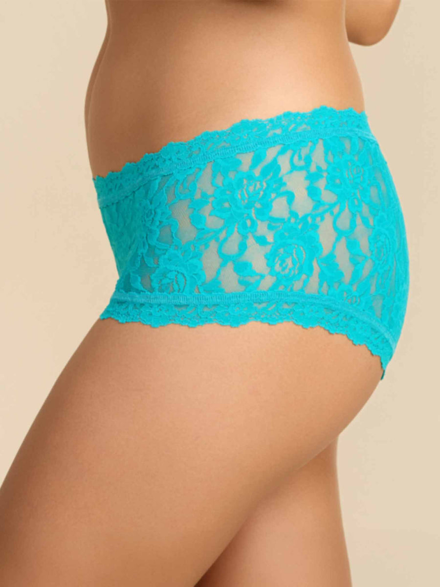 Model facing side wearing Signature Lace® Boyshort Turkish Tile Blue