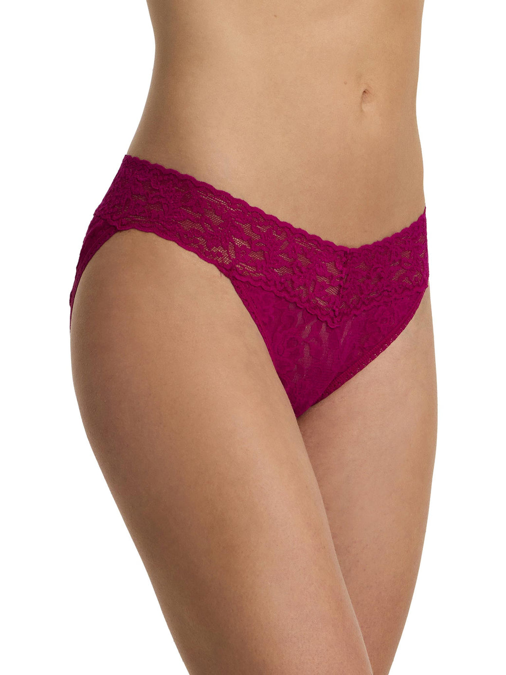 Lace underwear worn by a model on a white background