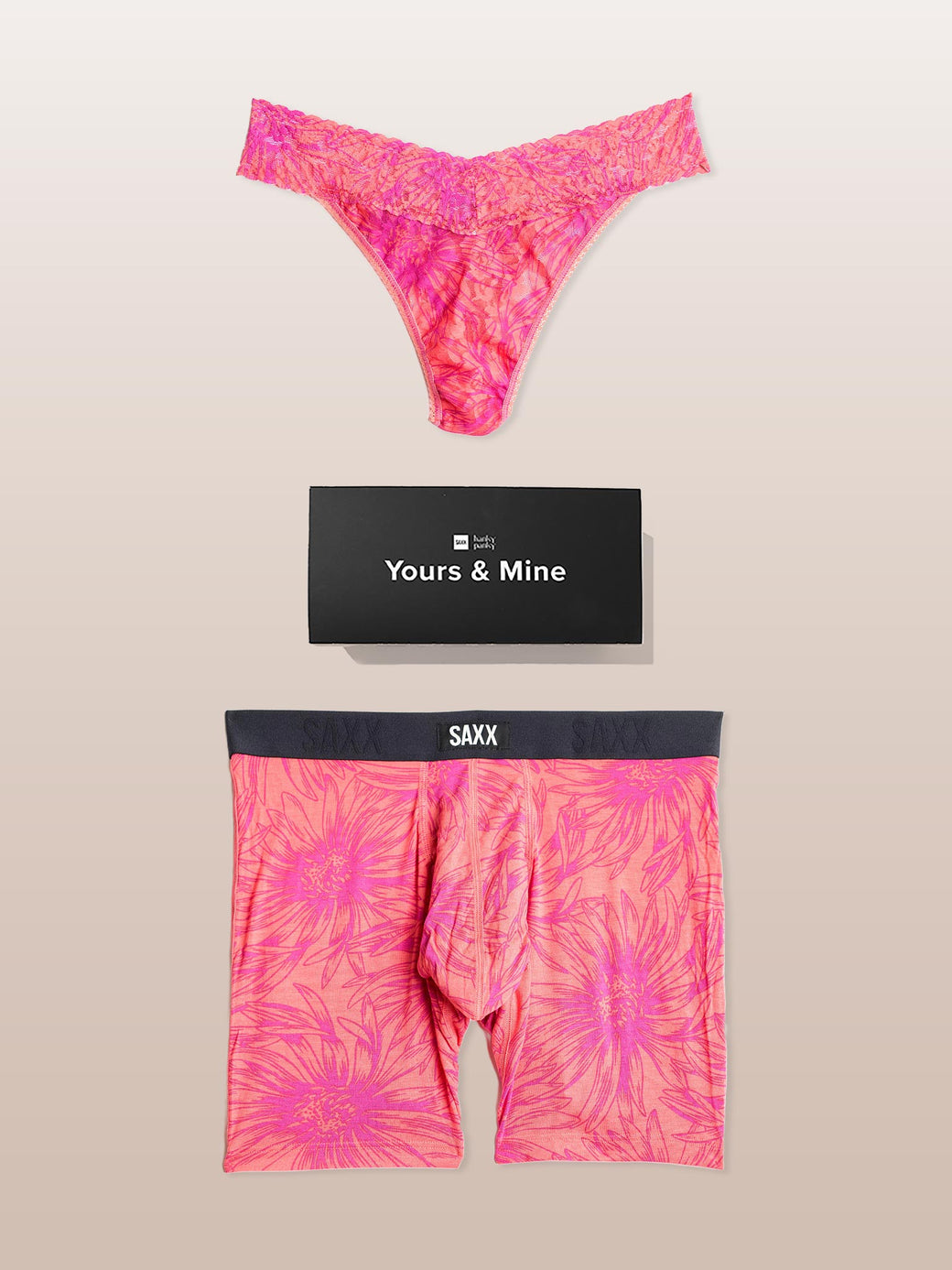 Pink tie-dye underwear set with 'Yours & Mine' and Saxx branding on a beige background