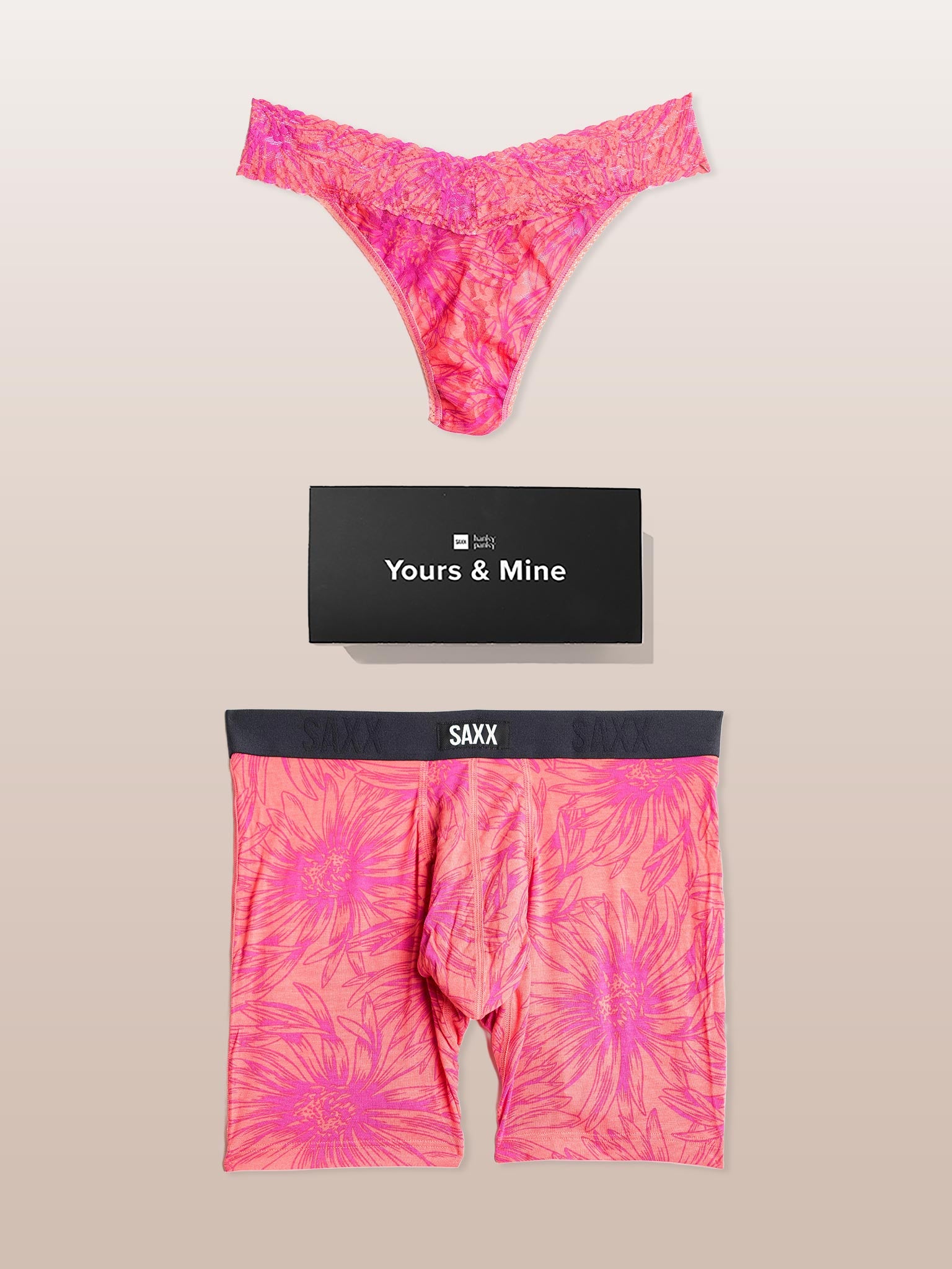 Pink tie-dye underwear set with 'Yours & Mine' and Saxx branding on a beige background