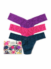 Three pairs of lace underwear in purple, pink, and blue with a floral-patterned box labeled 'hanky pankys' on a white background.
