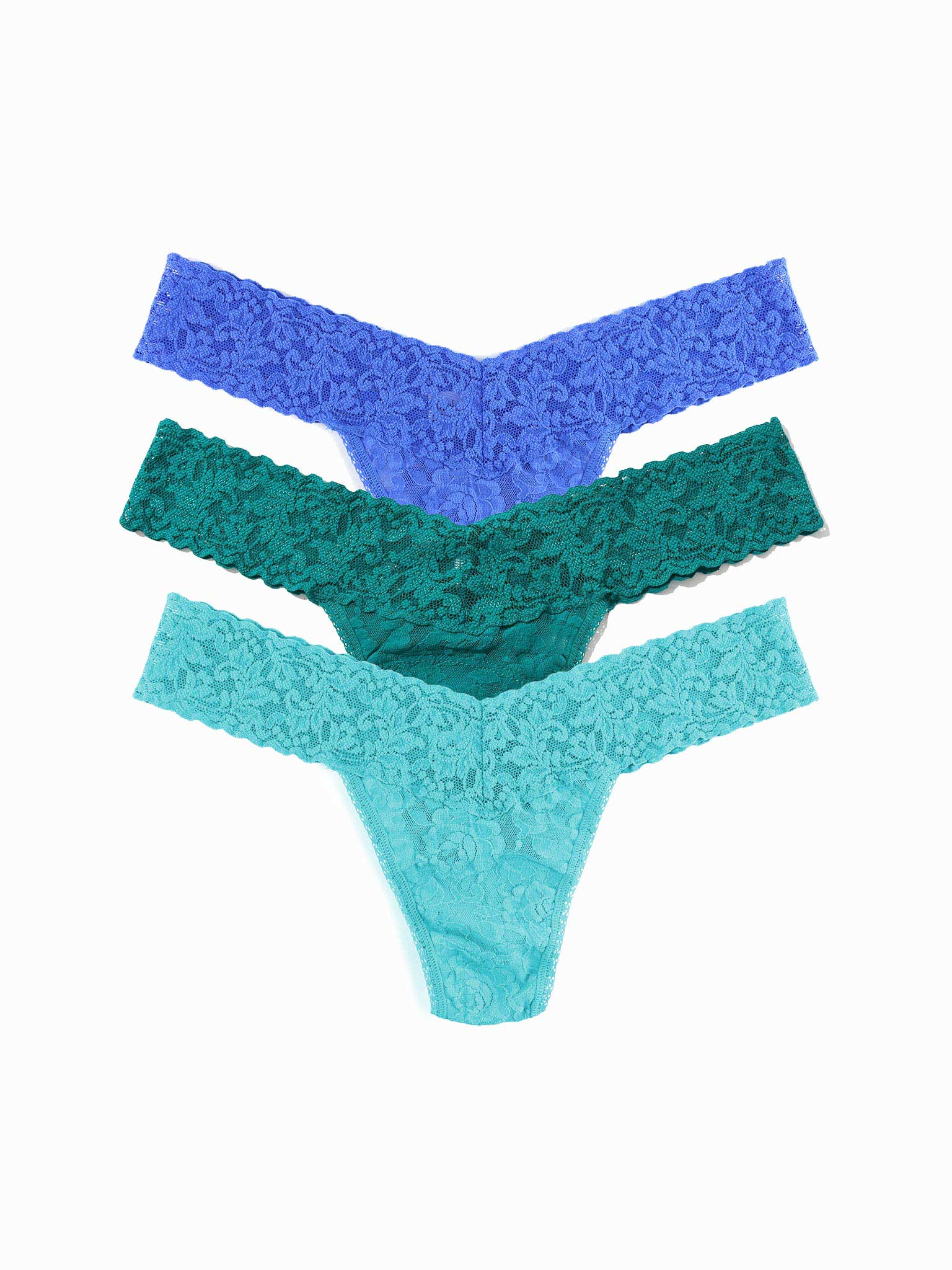 Three pairs of lace thongs in blue, green, and teal on a white background