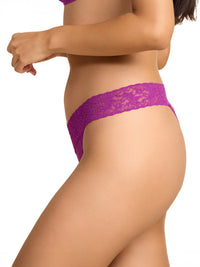 Model facing side wearing Signature Lace® Low Rise Thong Boysenberry Purple with white background