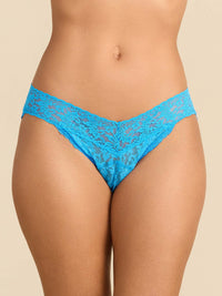 Blue lace underwear on a beige background