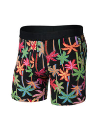 Colorful tropical palm leaf patterned boxer shorts on a black background
