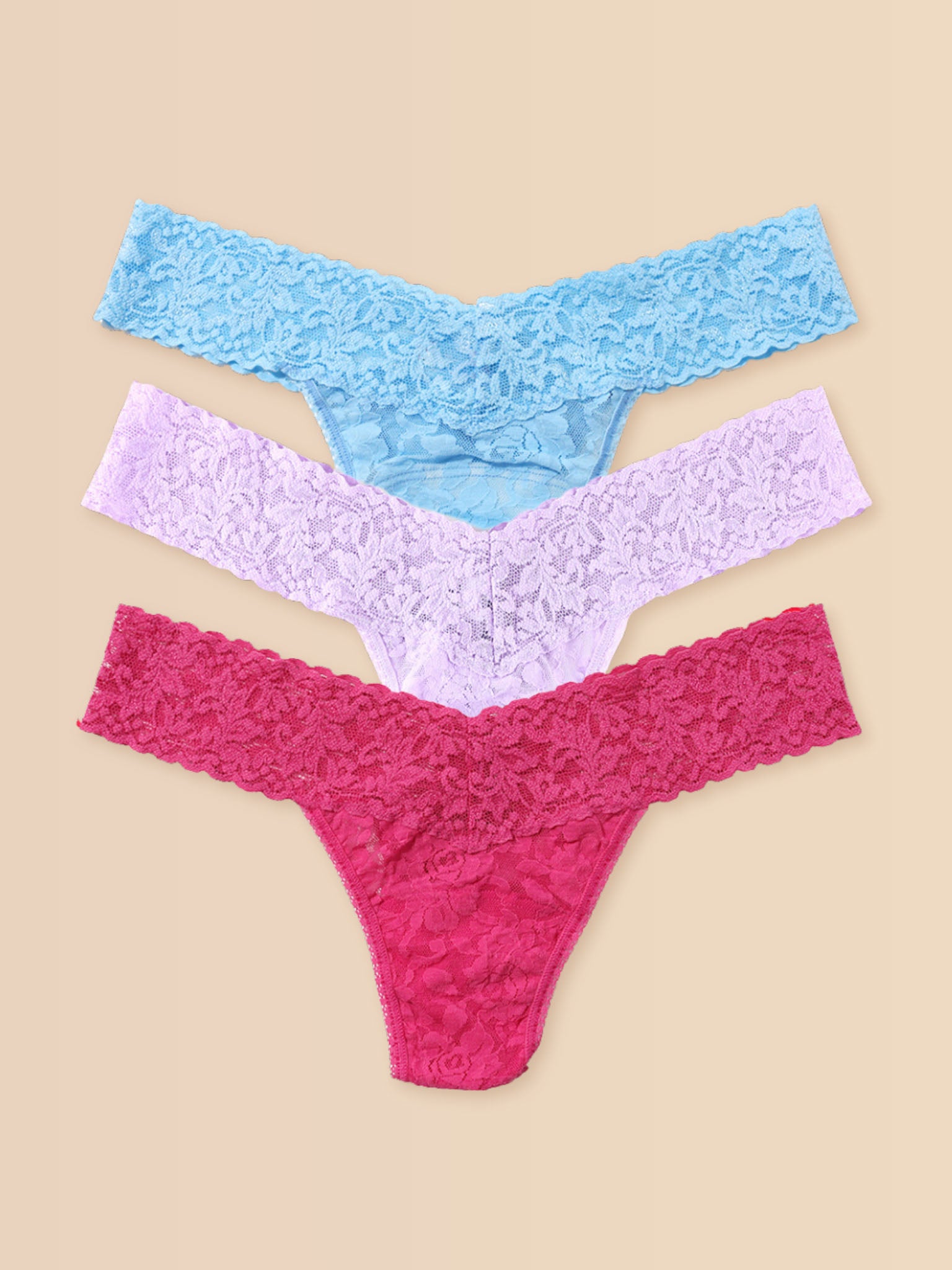 Signature Lace® Low Rise Thong 3-Pack Pastel Punch - Blue, Lavender & Pink Flat Lay on Cream | Hanky Panky