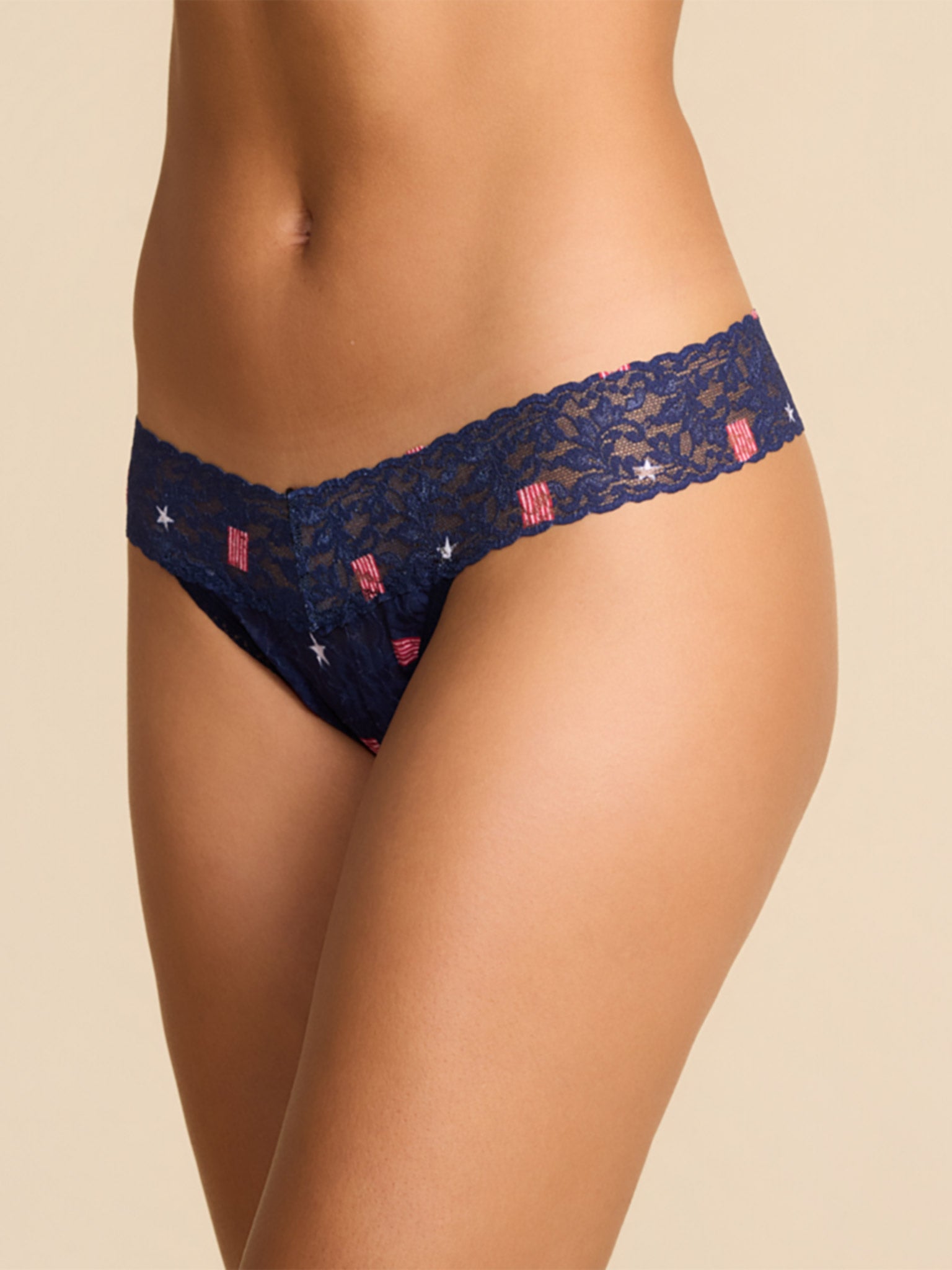 Navy USA Signet Signature Lace® Low Rise Thong - Side Profile On Model, Stars & Flags Lace Detail | Hanky Panky