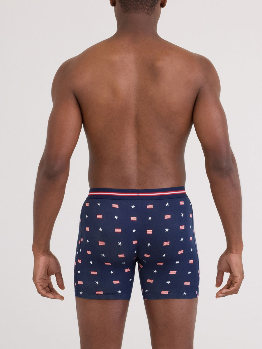 Man wearing navy SAXX Super Soft Vibe Boxer Brief USA Signet Maritime stars and flags print - Back View | Hanky Panky