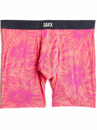 Pink floral patterned boxer briefs with 'SAXX' branding on a white background