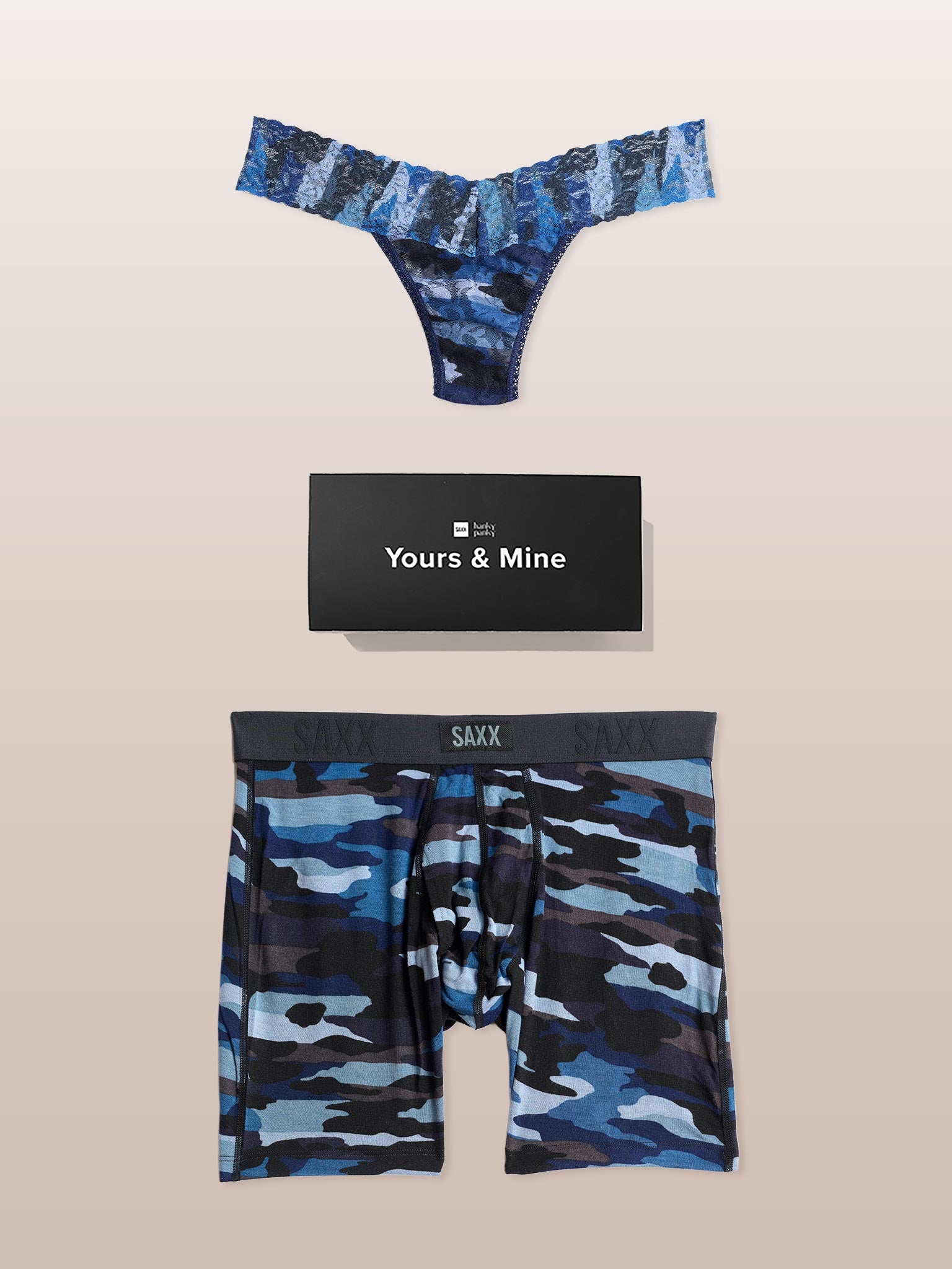 Blue camouflage underwear set with 'Yours & Mine' and Saxx branding on a beige background