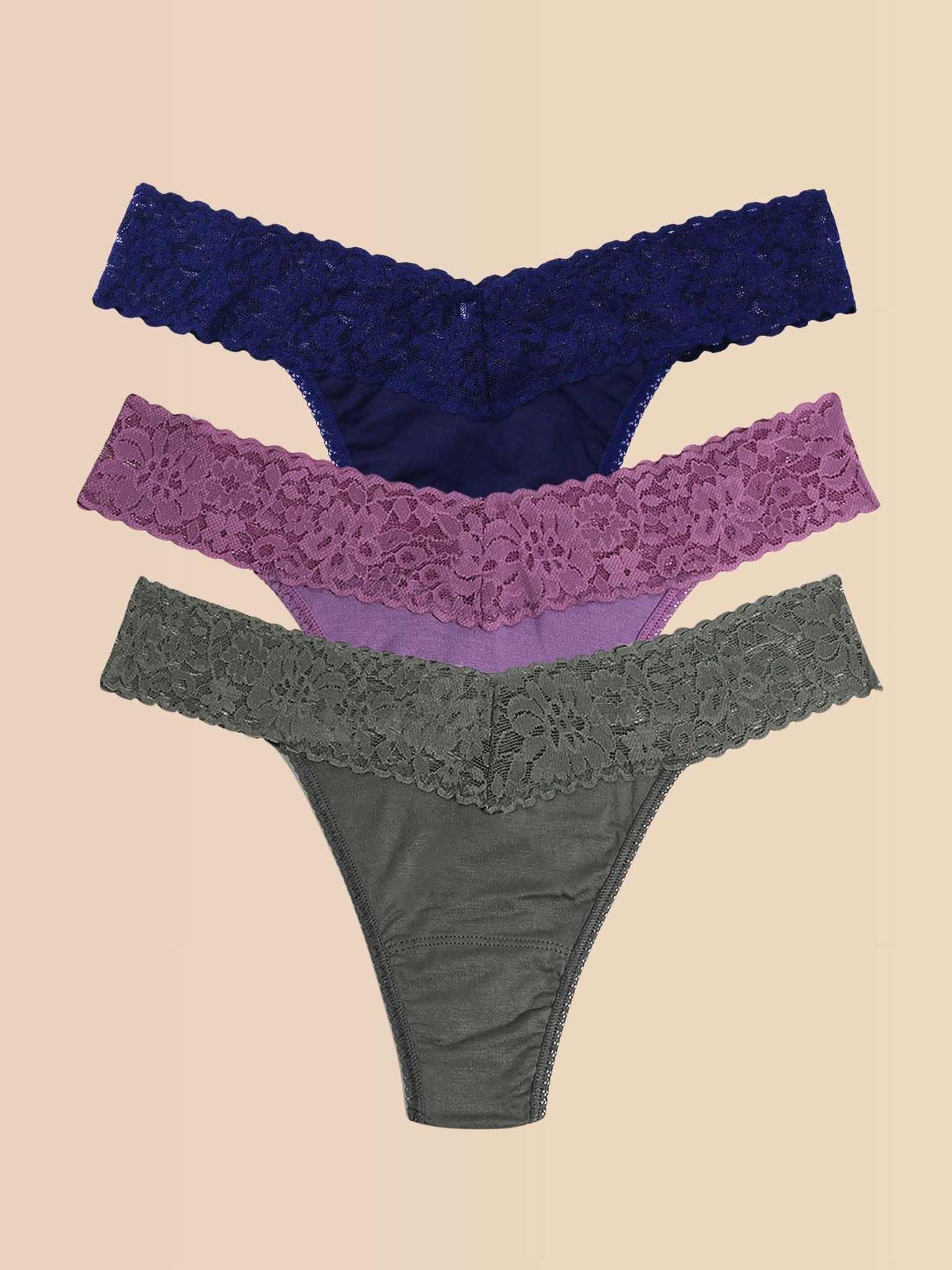 DreamEase™ Modal Thong 3-Pack Indigo, Berry Pie Purple & Grey - Flat Lay on Cream | Hanky Panky