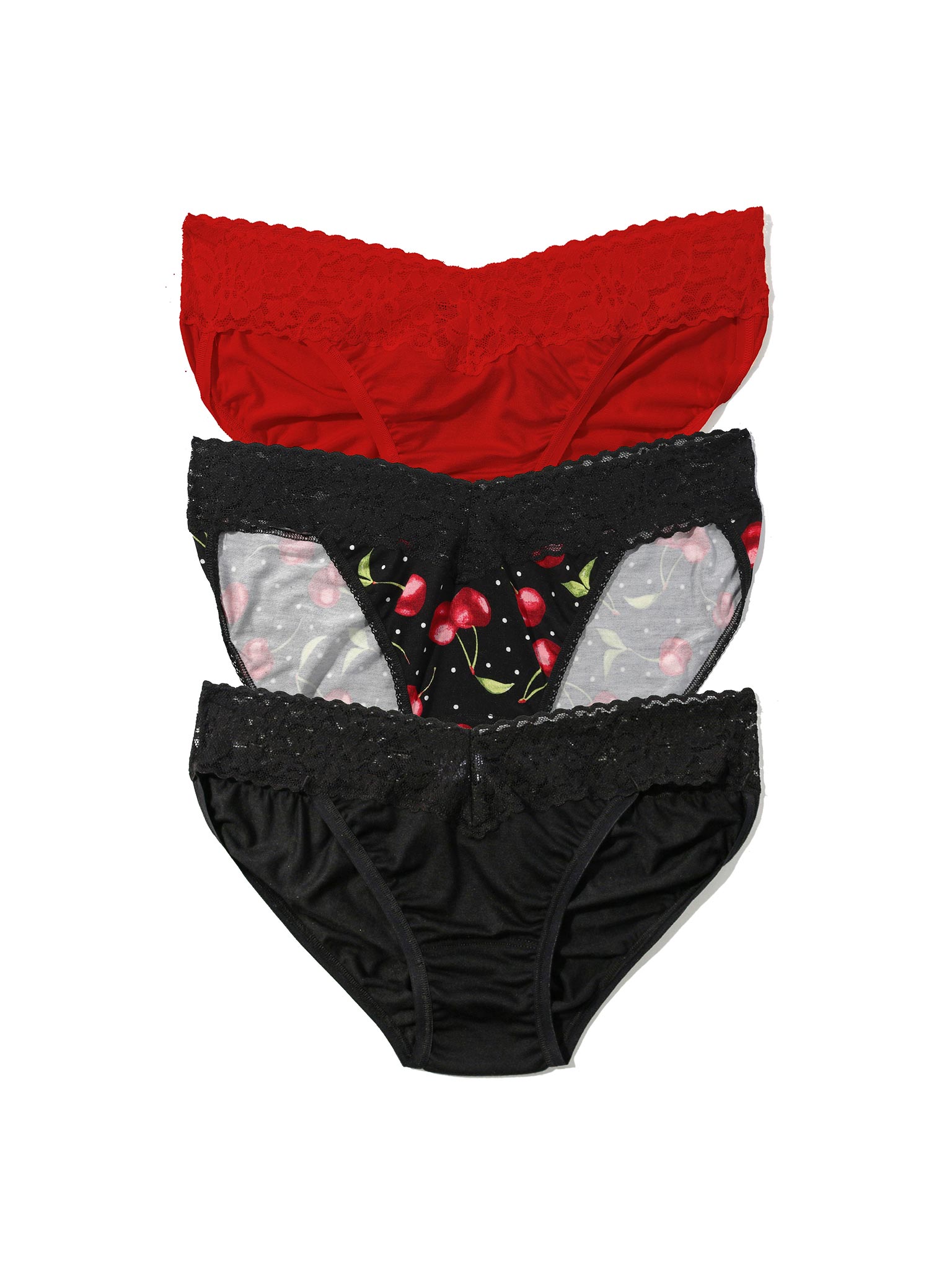 Three pairs of women's underwear in red, black with floral pattern, and black with lace trim on a white background.