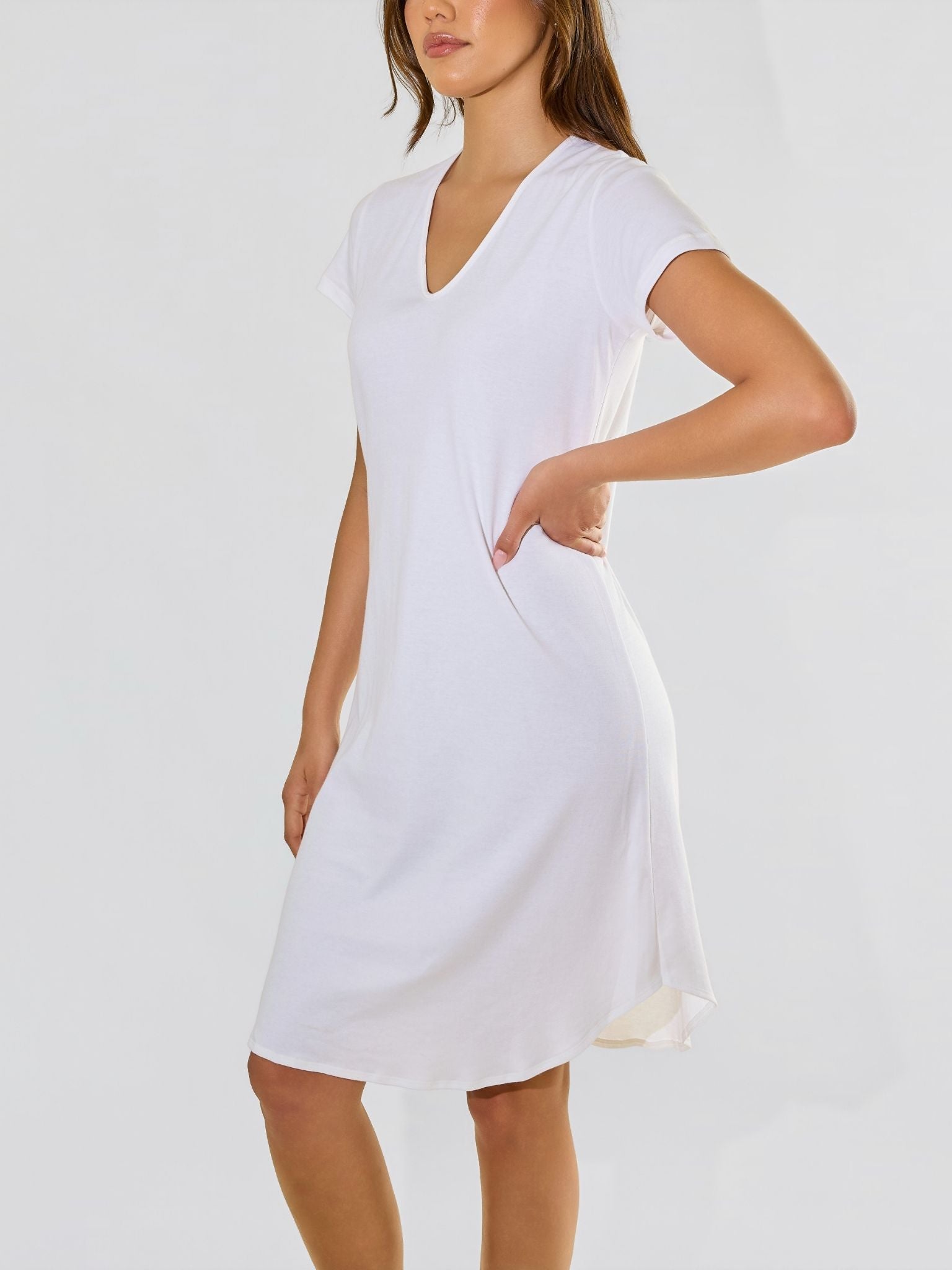 Model posing to side in Supima® Cotton Gown White