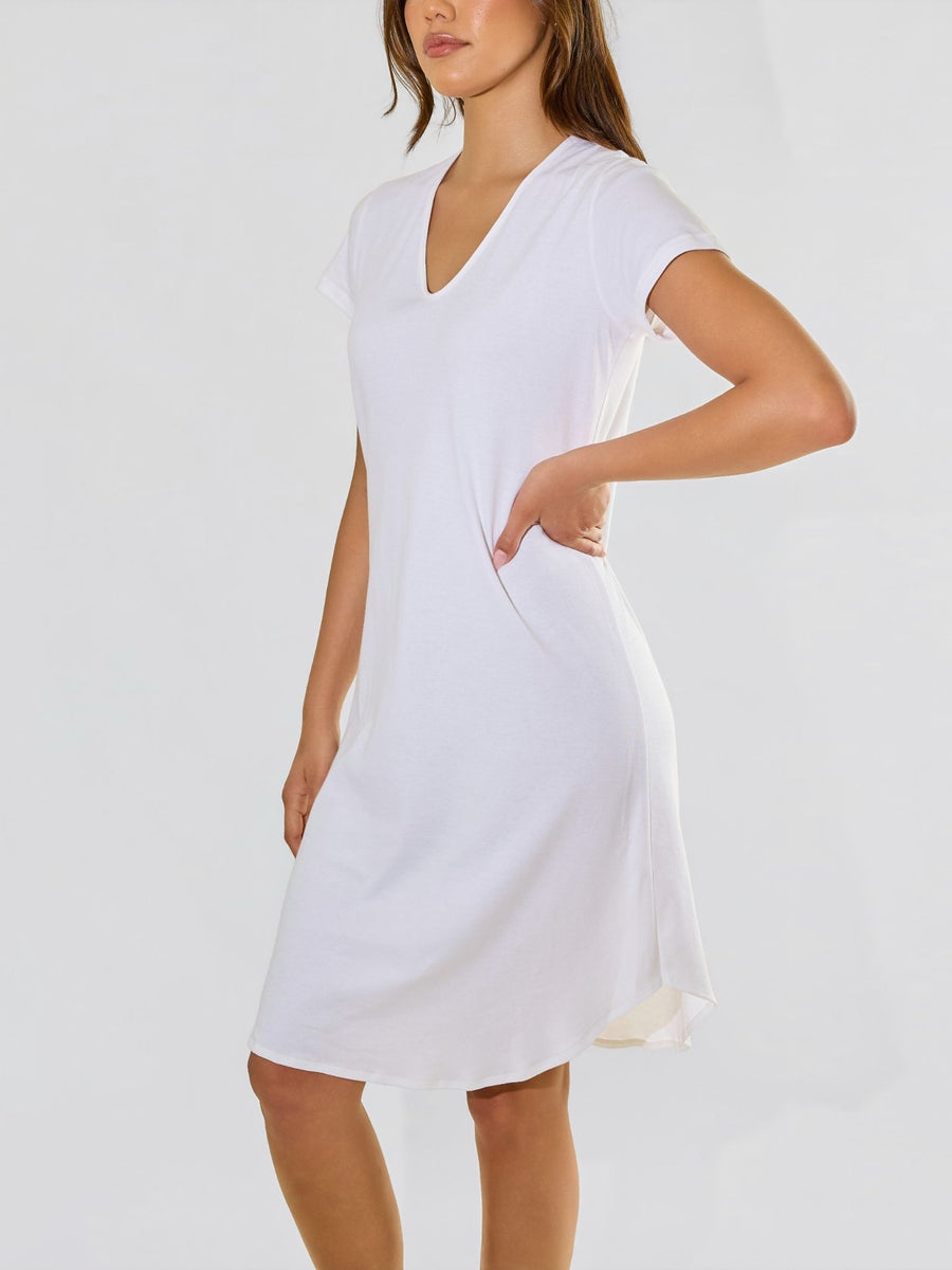 Model posing to side in Supima® Cotton Gown White