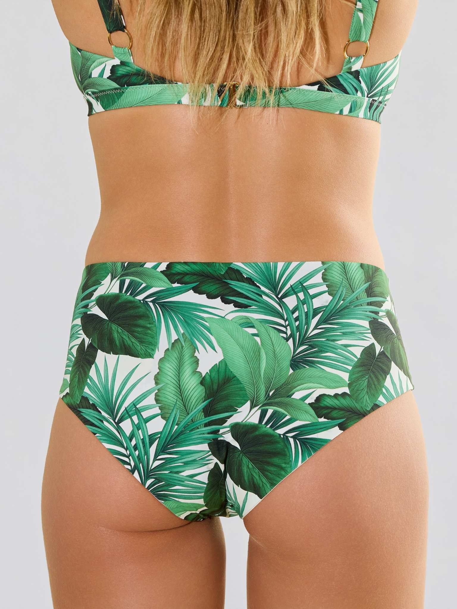 Model facing back Swim High Rise Bottom Stay Floral Palm Tree Green set