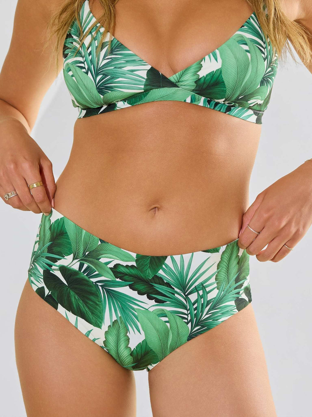 Model front view of Swim High Rise Bottom Stay Floral Palm Tree Green with matching top