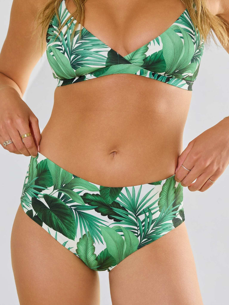 Model front view of Swim High Rise Bottom Stay Floral Palm Tree Green with matching top