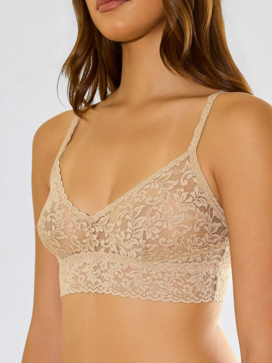 Model facing side in V-Neck Retro Lace Bralette Chai