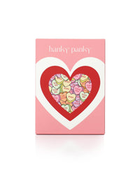 Hanky Panky underwear packaging with a heart design on a pink background