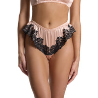 Lace-trimmed lingerie set on a neutral background