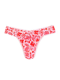 Red and white ornamints patterned bikini bottom on a white background