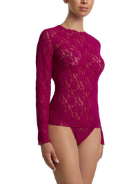 Purple lace long-sleeve top on a white background