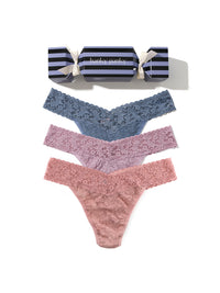 Set of lace underwear in blue and pink with striped candy canes on a white background