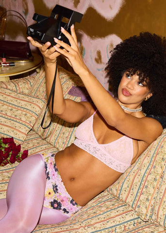 Pressed Pink Floral Print Signature Lace® French Brief - On Model Reclined with Polaroid Camera | Hanky Panky