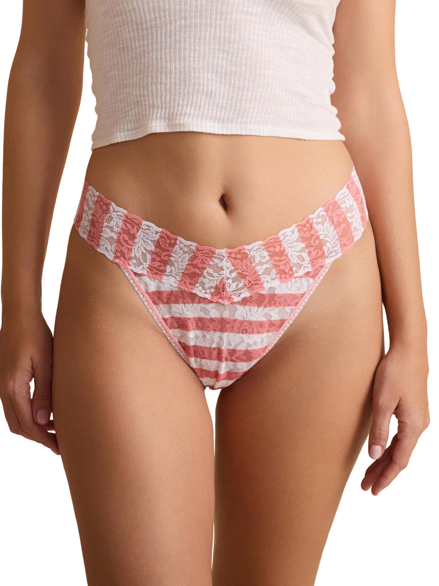 Red and white striped beach thong bottom worn by a person on a white background
