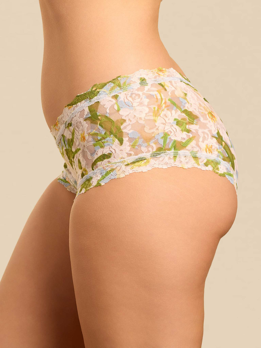 Floral-patterned underwear on a beige background