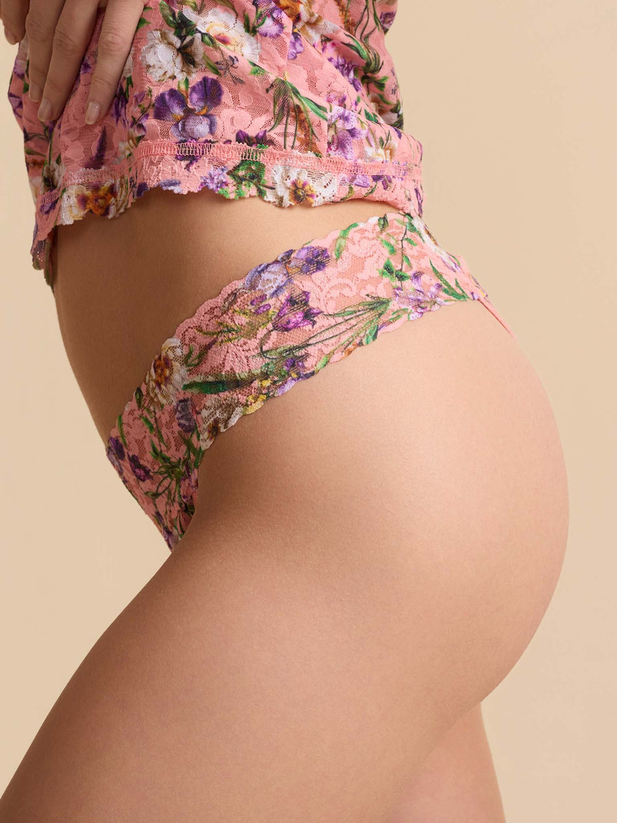Coral pink floral Signature Lace® low rise thong on model - Side Detail, scalloped lace waistband, matching set | Hanky Panky