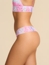 Rem Pink printed Signature Lace® Low Rise Thong, side profile on model showing low rise fit, floral lace | Hanky Panky