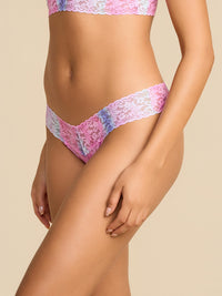Rem Pink printed Signature Lace® Low Rise Thong, three-quarter side view on model, multicolor lace thong | Hanky Panky