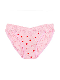 Pink lace underwear with red heart patterns on a white background