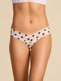 Lace polka dot underwear on a beige background