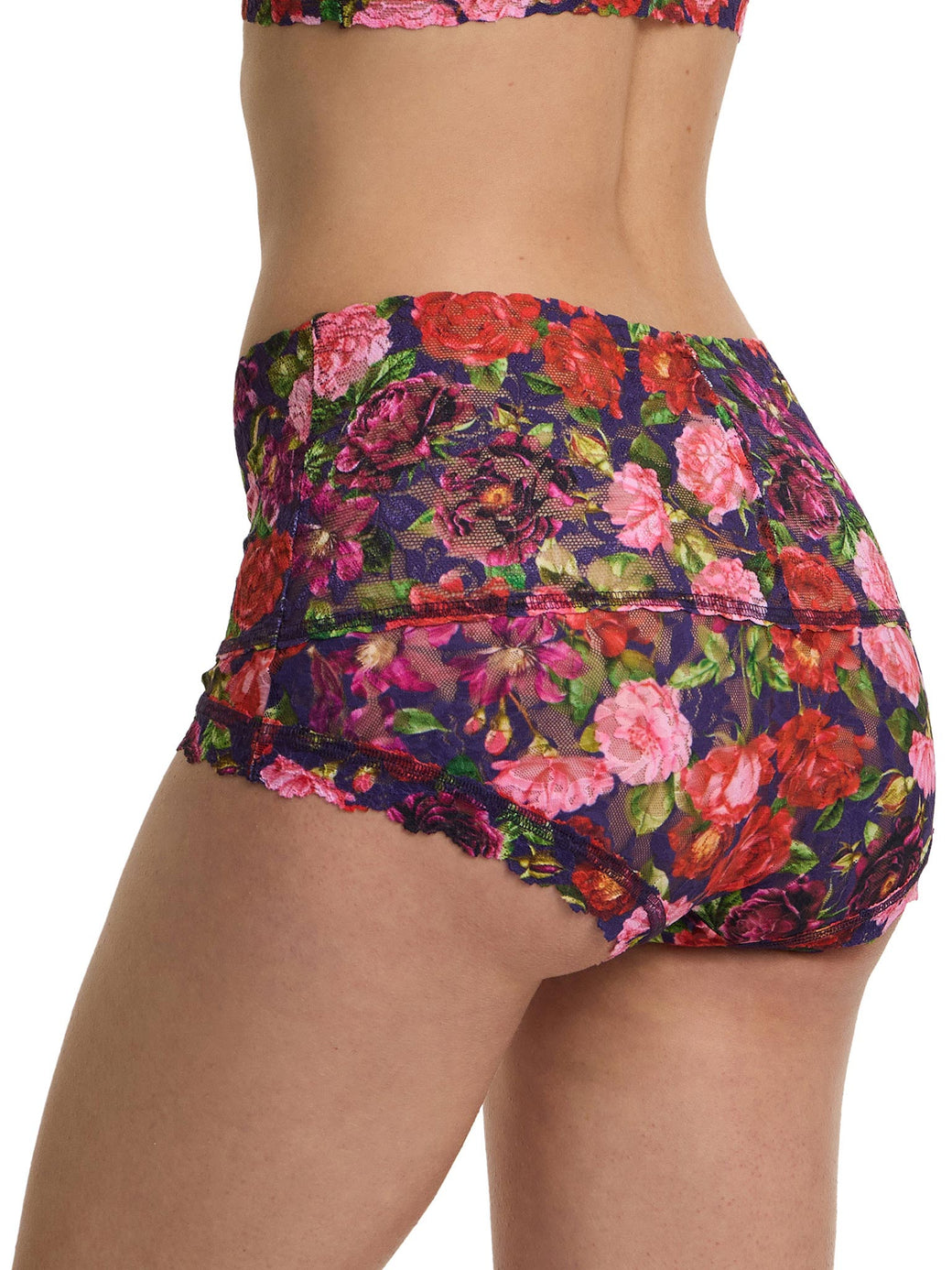 Floral patterned shorts on a white background