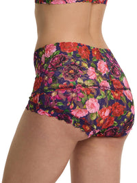 Floral patterned shorts on a white background