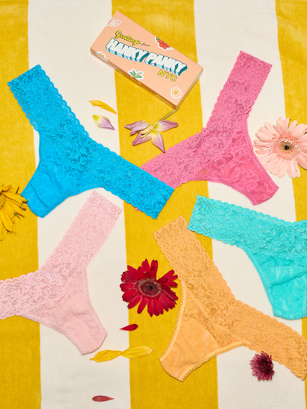 five different colored lace thongs with hanky panky packaging as a colage on striped background