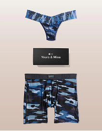 Blue camouflage underwear set with a black box on a beige background