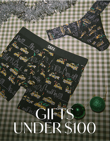 Black boxer briefs with yellow truck pattern on a checkered tablecloth, with 'Gifts Under $100' text.